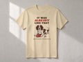 It Was Already Like That T-shirt – flat lay, Sand