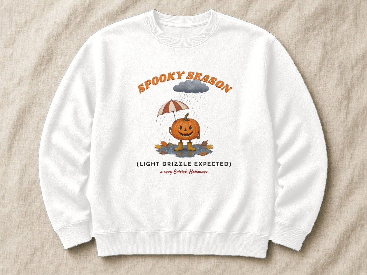 Spooky Season (Light Drizzle Expected) sweatshirt – flat lay, Arctic White