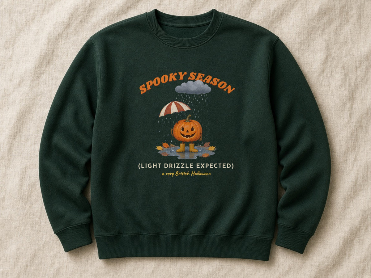Spooky Season (Light Drizzle Expected) sweatshirt – flat lay, Bottle Green