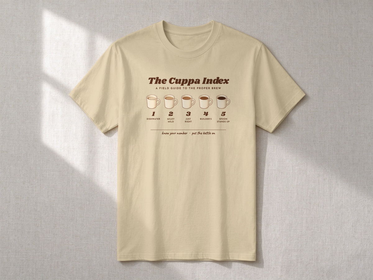 The Cuppa Index T-shirt – flat lay, Sand