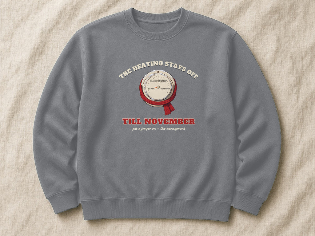 The Heating Stays Off Till November sweatshirt – flat lay, Steel Grey