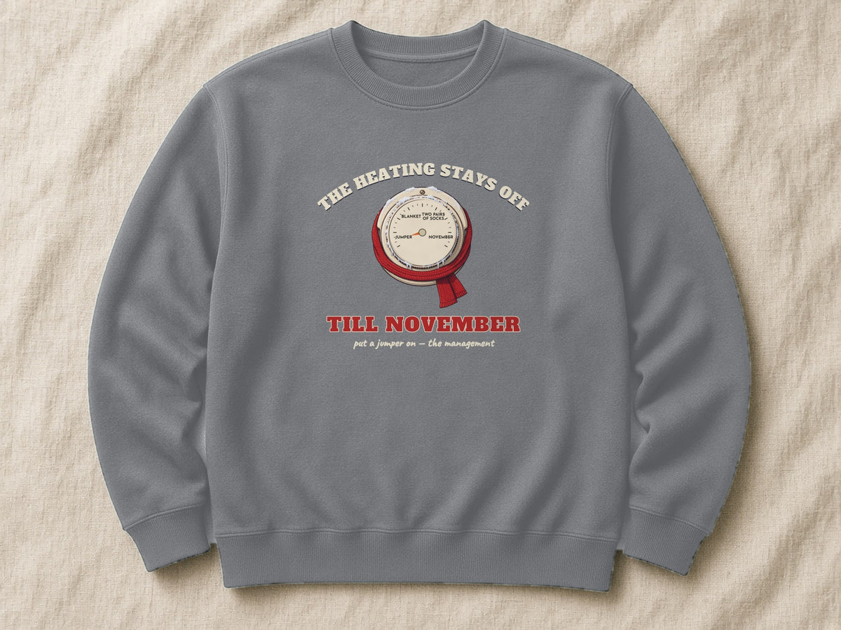 The Heating Stays Off Till November sweatshirt – flat lay, Steel Grey